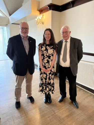 Kitty Thompson pictured at the Supper Club event with Skegness Branch president Mr Will Mitchell, left, and branch chairman Cllr Dick Edginton, right